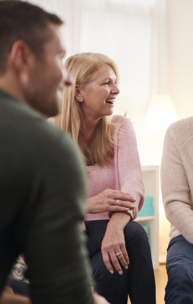 A compassionate therapist offering behavioral services and mental health support to a client at our Livonia clinic.